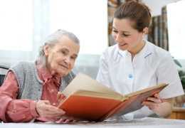 old man reading a book
